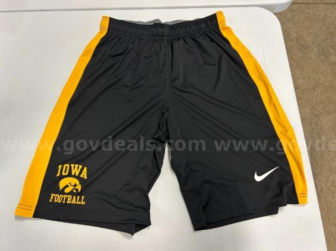 Lot of 2, Nike "U of I' Football Dry-Fit Shorts, Black in color. Size: M