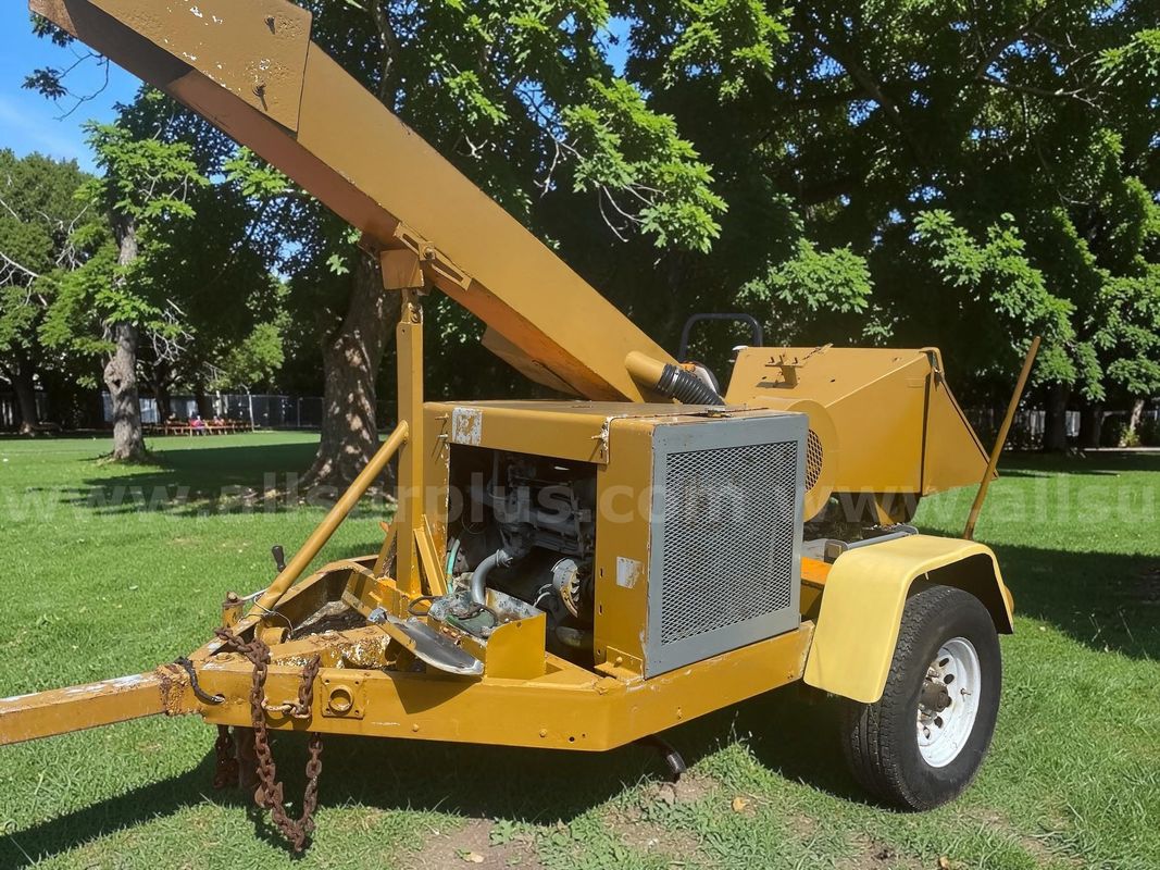 Tow-behind Drum-style Wood Chipper powered by a Ford Industrial Diesel Engine