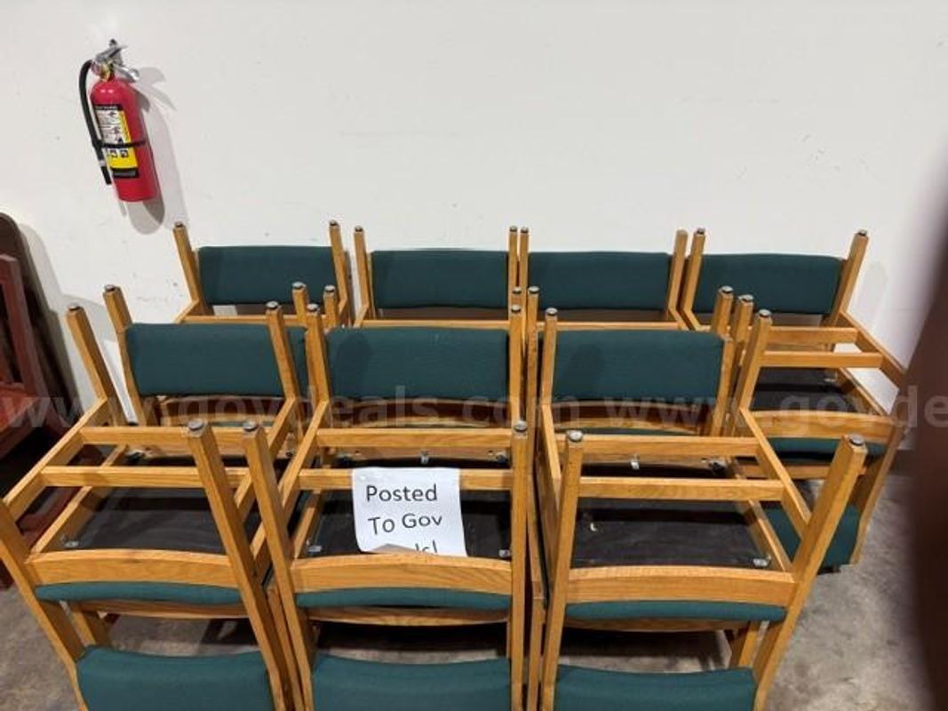 14 Wooden Media Chairs with Green cushion on the back