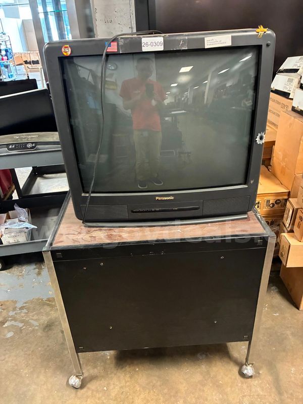 Older Panasonic tv and cart