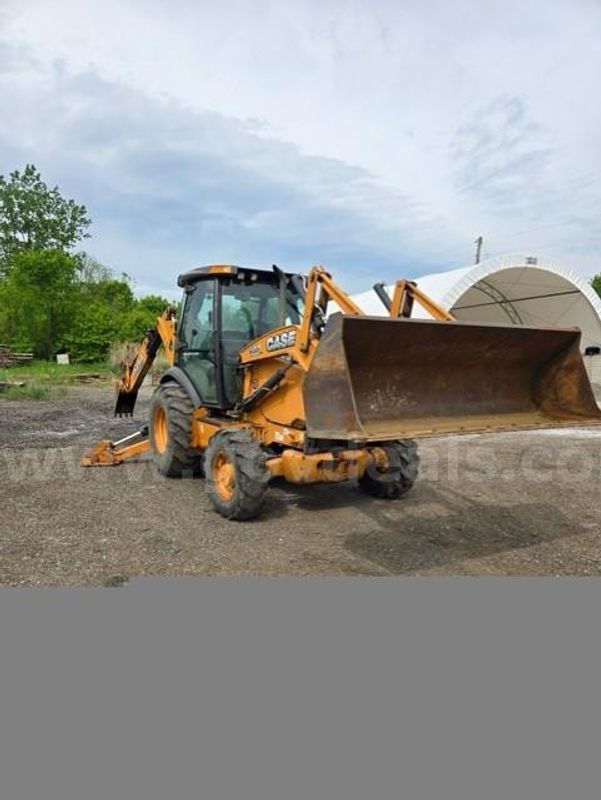 Case 580SN-WT Backhoe w/extra 2-yard bucket
