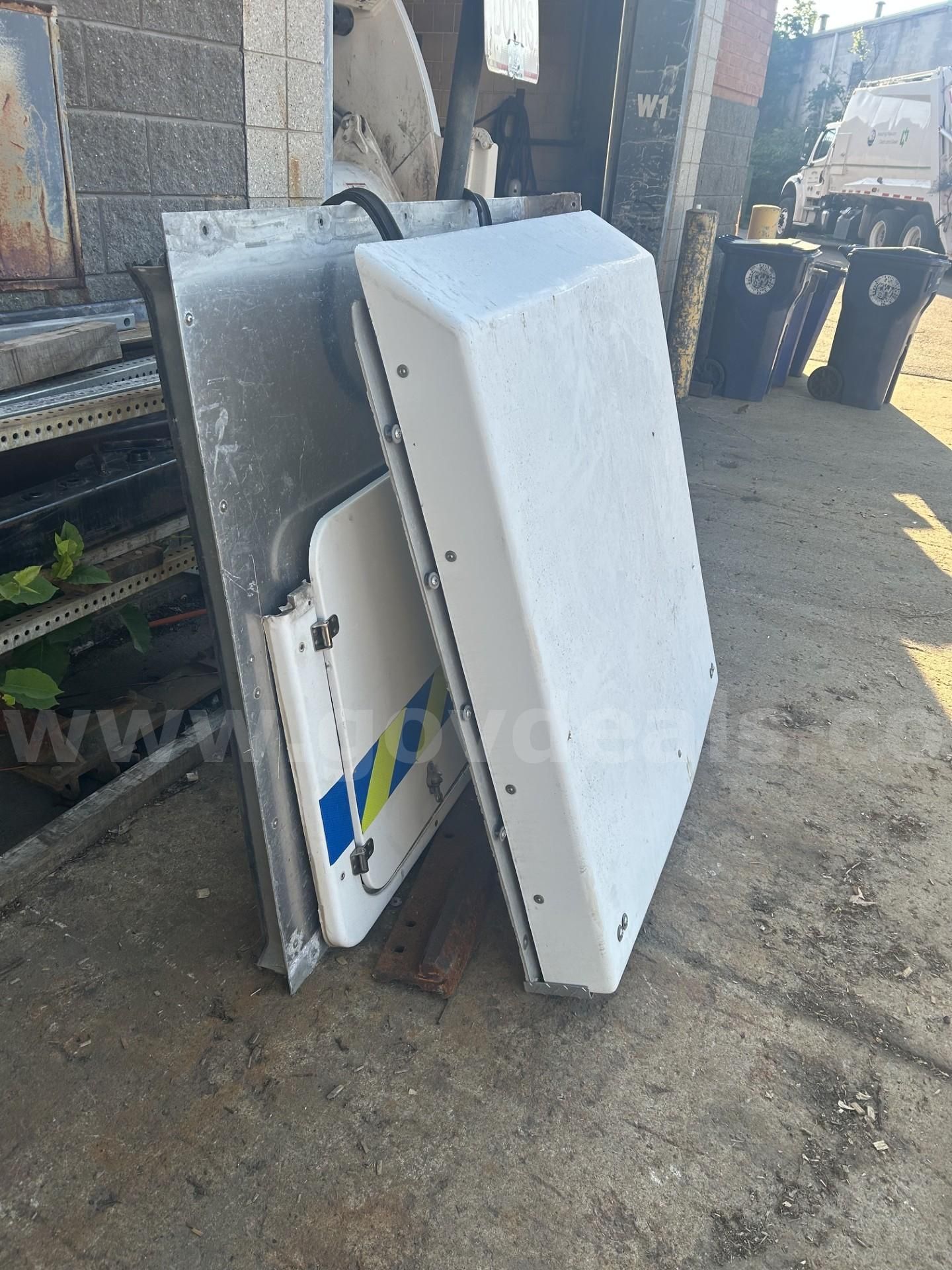 Sliding cap and barn doors removed from 8’ utility body