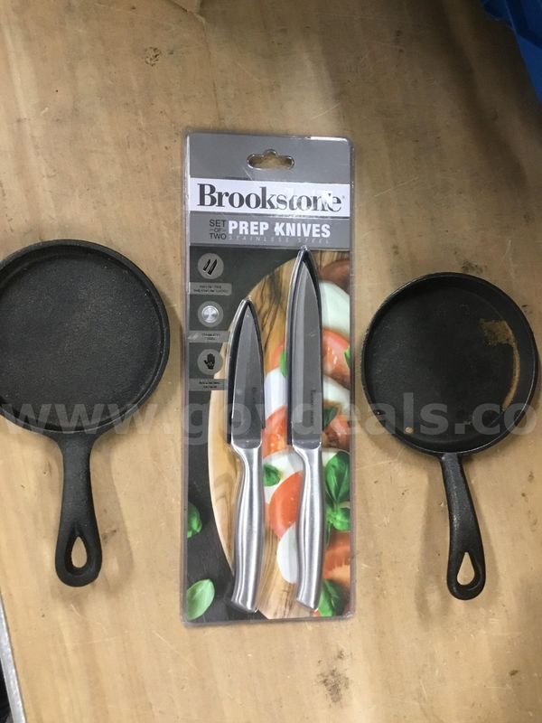 Lot of misc box items-Two 5 inch black pans, & a pair of Brookstone prep knives "DH"