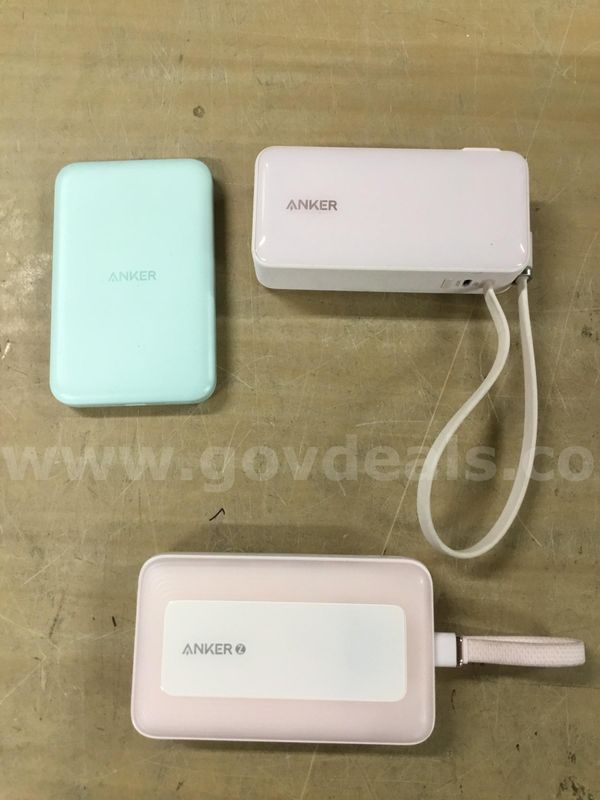 Lot of misc box items-mint green, and two pink Anker portable chargers "DH"