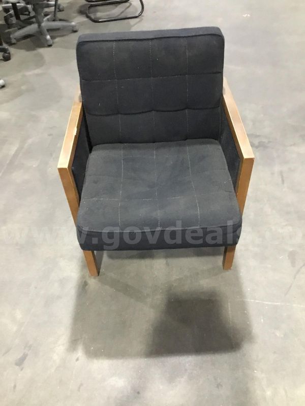 Black chair; with light oak hardwood armrests "DH"