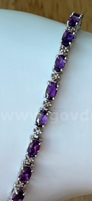 TiDDRs: Lovely 7" Amethyst Tennis Bracelet, stamped 925 Sterling Silver.