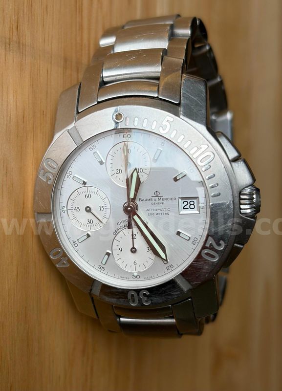 TiDDRs: Baume & Mercier Chronograph Men's Watch. Stainless Steel. One release button on clasp needs replacement.