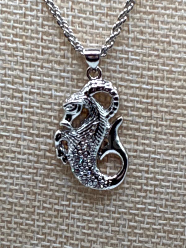 1MM, Rhodium Clad (Silver), 16 Inch, French Rope Chain W/ Capricorn Pendant