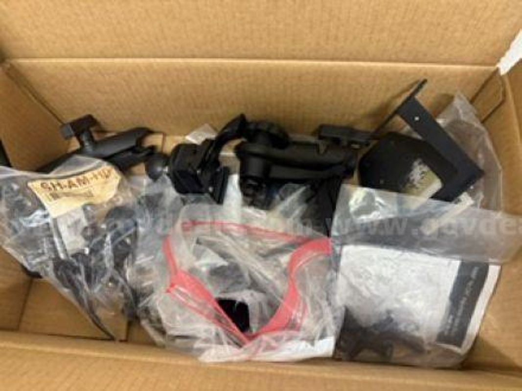 Lot features 5 complete vehicle device mounts (4 for Surface Pro, 1 for standard tablet) plus an assortment of misc.