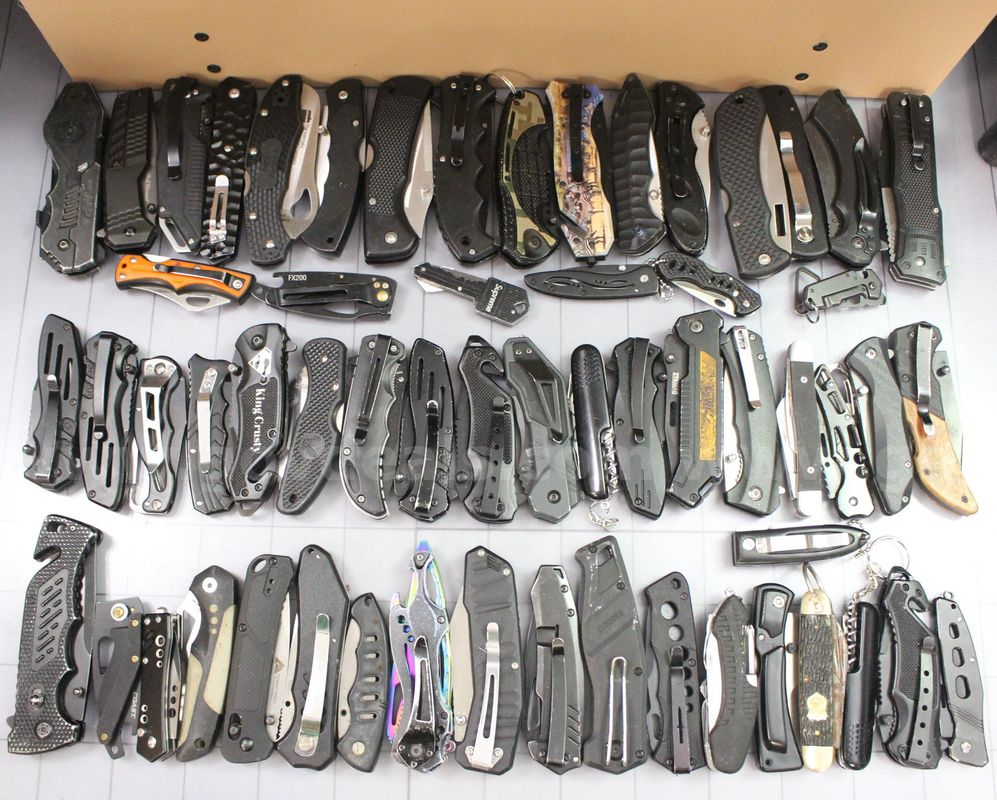 Approximately 12 lbs. of Assorted Black Knives, #35725