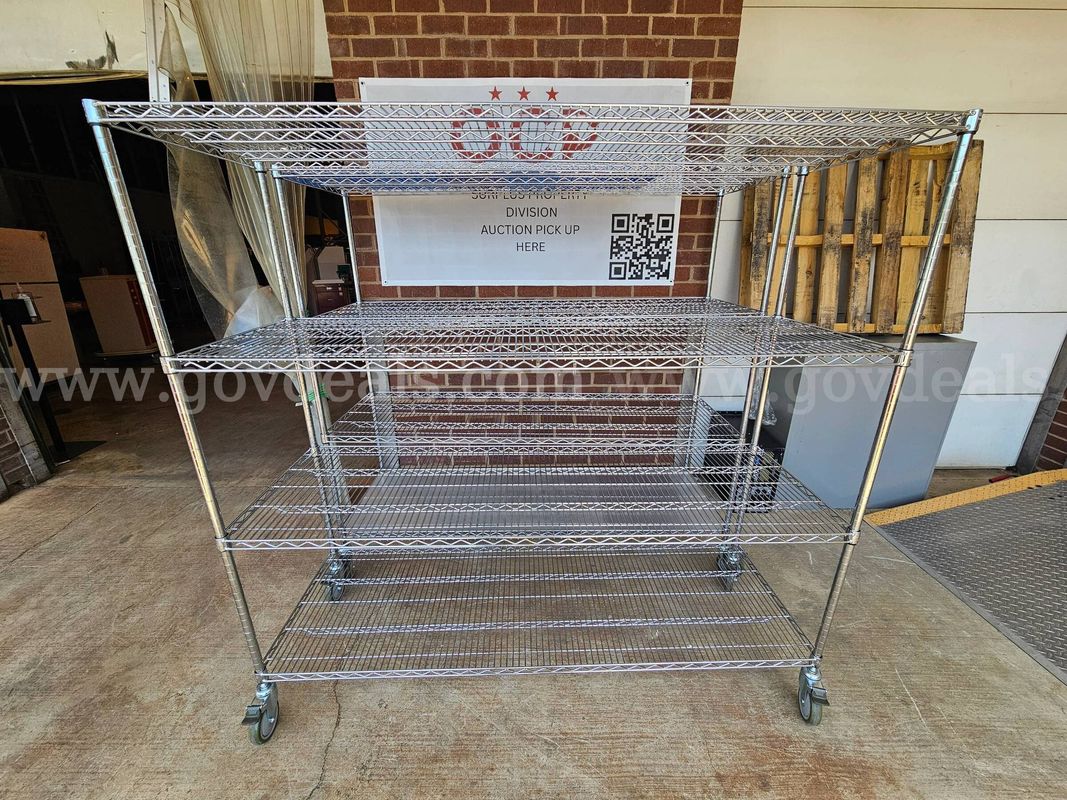 Lot of 2- Metal racks on wheels -  61.5" H  X  71" W