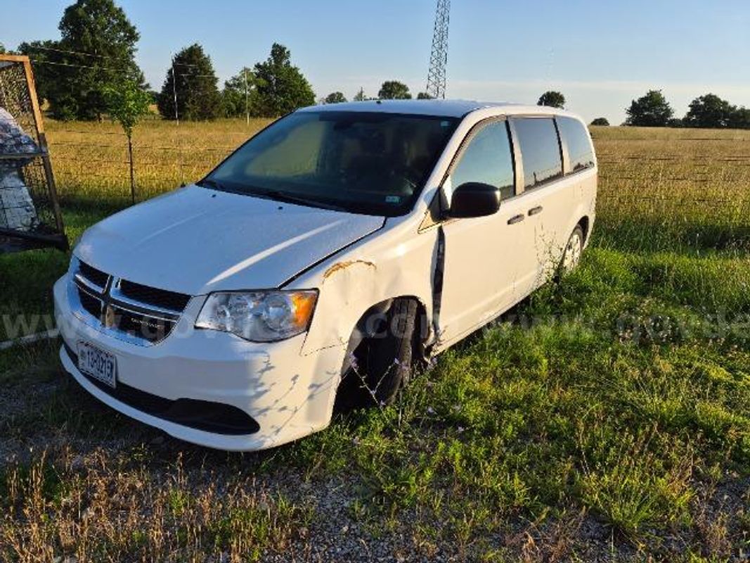 2019 Dodge Grand Caravan; 165,653 Miles.