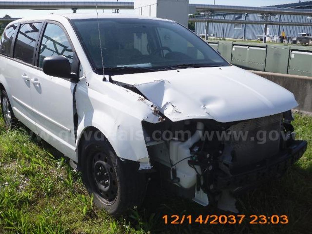 2015 Dodge Grand Caravan; 173,104 Miles.