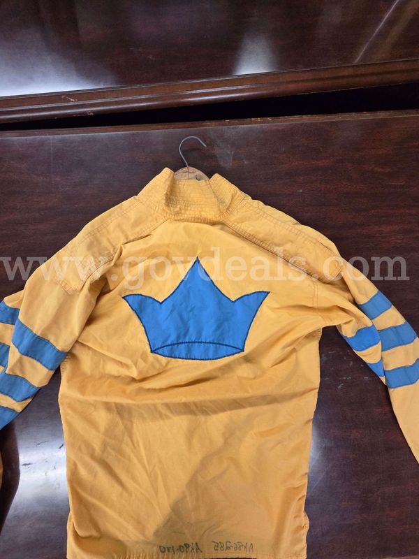 Racing Silks (2), Preakness Baseballs (5), 1950s & 60s Racing Publications (52) & Commemorative Wine Glasses #142 (36)))