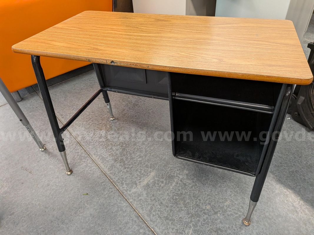 elementary desk with wood top and metal side cubby