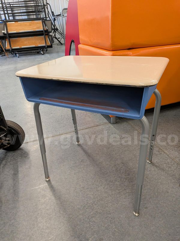 elementary desk with plastic cubby and beige top
