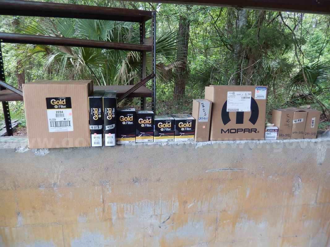 USED (13) ASSORTED CAR FUEL, AIR, HYDRAULIC, AND TRANS FILTERS