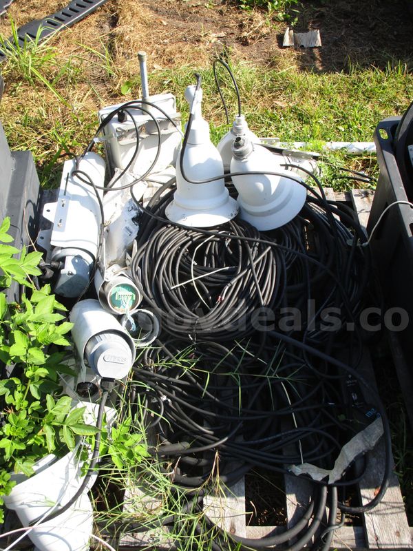 (6) Used Bell Shaped Cameras; (4) Used Cylinder Shaped Cameras, And A Pile Of Wire