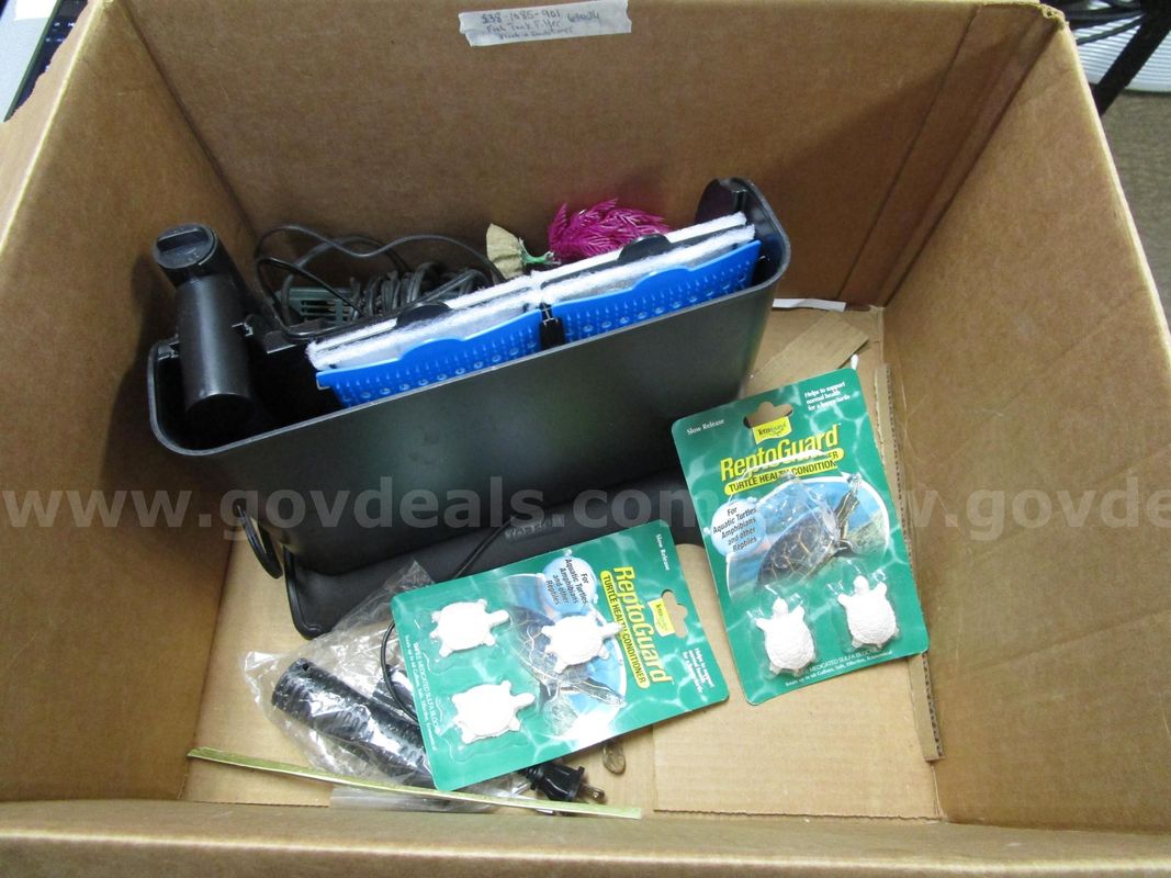 Box Of (1) Used Fish Tank Filter W/ (1) Used Fake Plant And (2) Repto Guard Packs