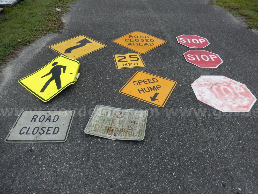 Used (3) Stop Signs, (1) Pedestrian Crossing Sign, (1) Road Closed Ahead Sign, (1) Speed Hump Sign, (1) 25 Mph Sign