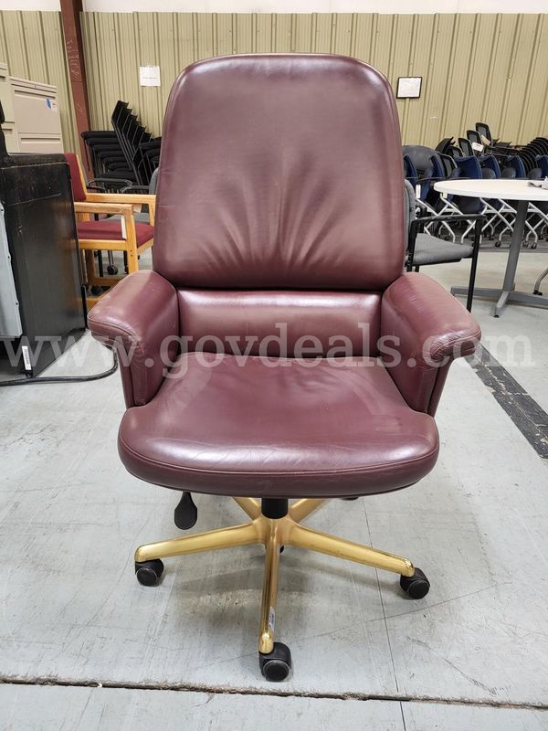 Red leather chair with NM State seal