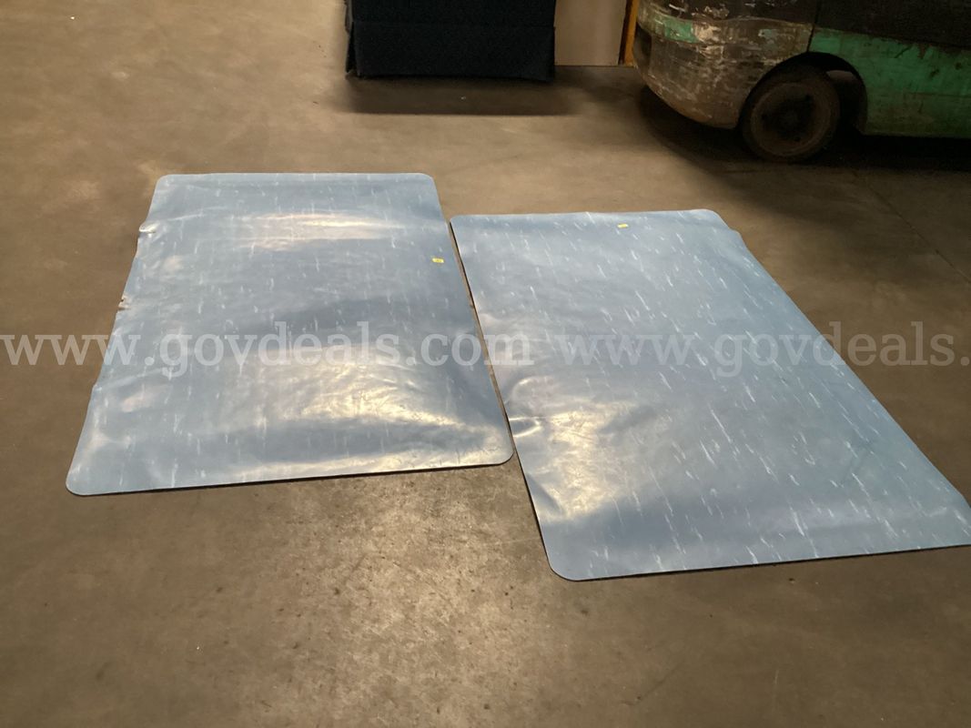 2 - Rubber Cushioned Mats.