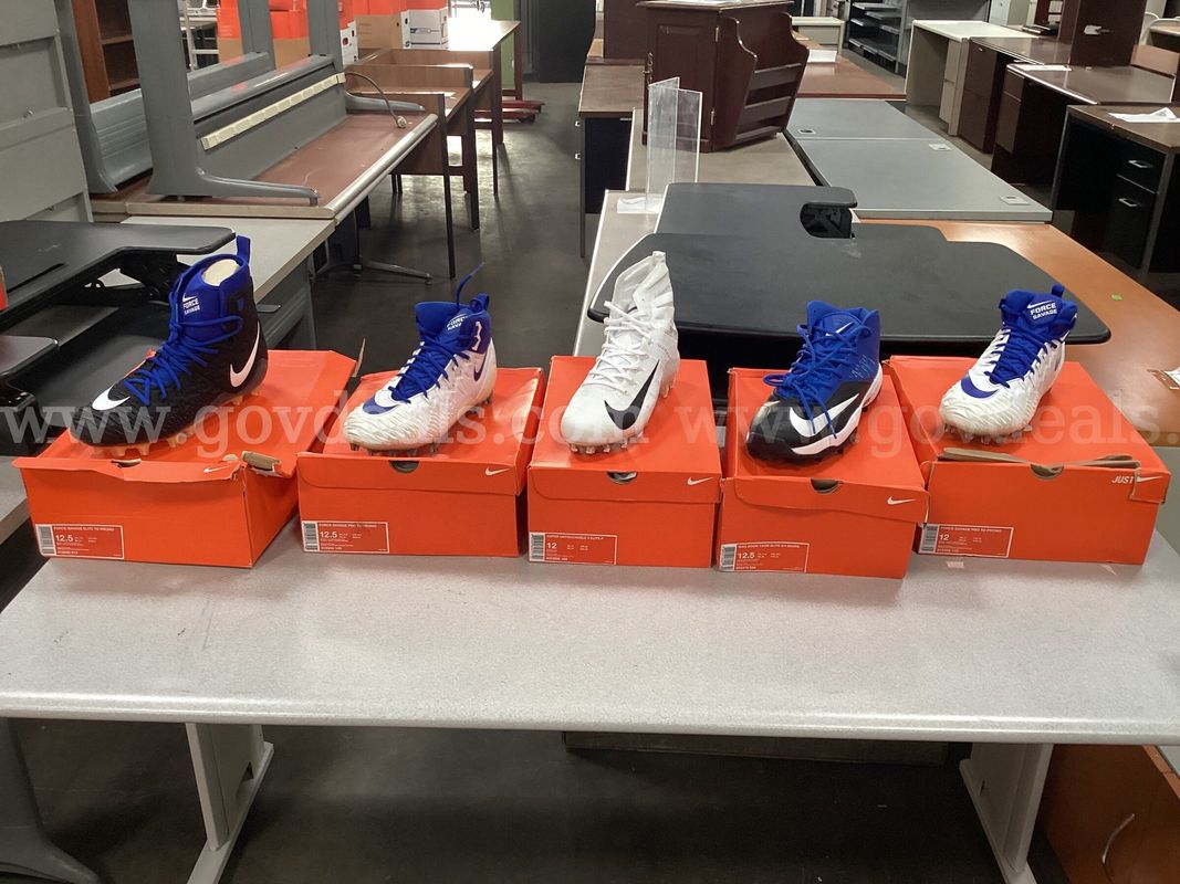 5 - Pairs of Nike Cleats (2 - size 12 and 3 - size 12.5)
