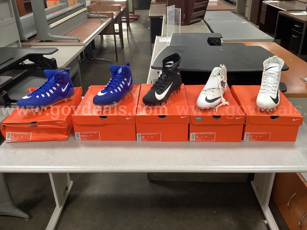 5 - Pairs of Nike Cleats (1 - size 11, 3 - size 12, and 1 - size 12.5)
