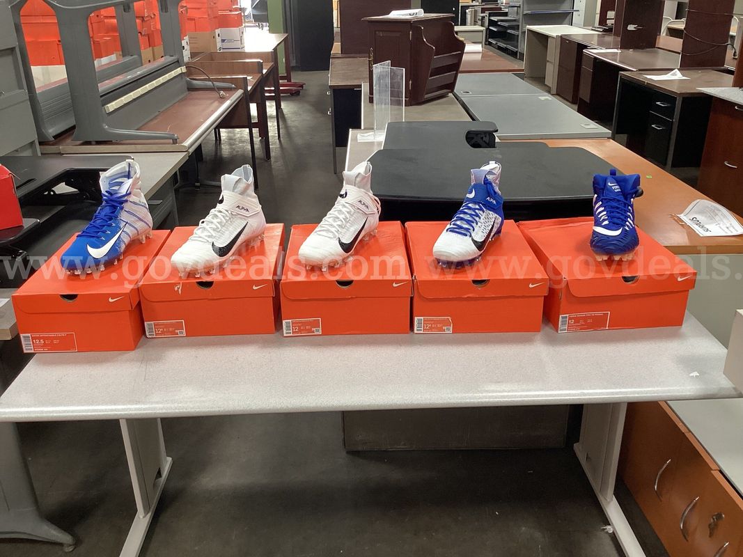 5 - Pairs of Nike Cleats (2 - size 12 and 3 - size 12.5)