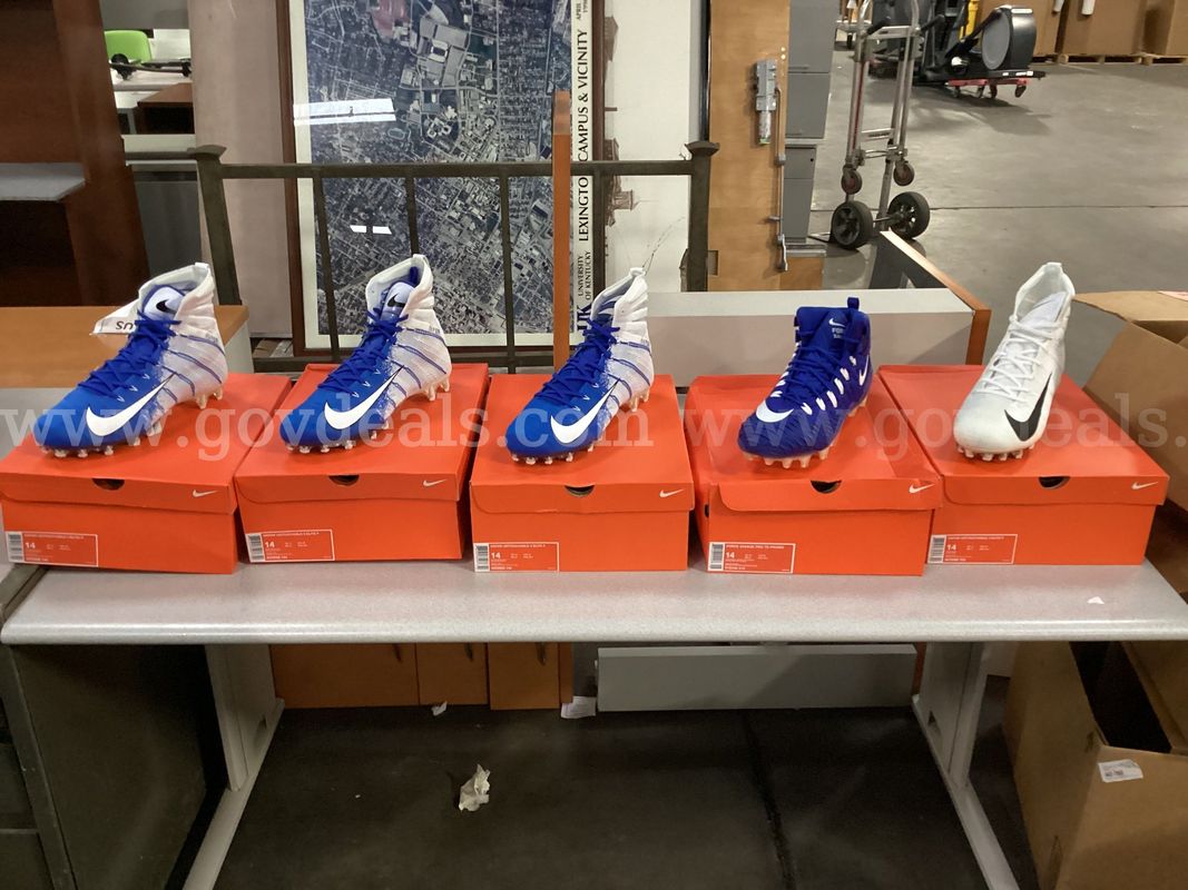 5 - Pairs of size 14 Nike Cleats