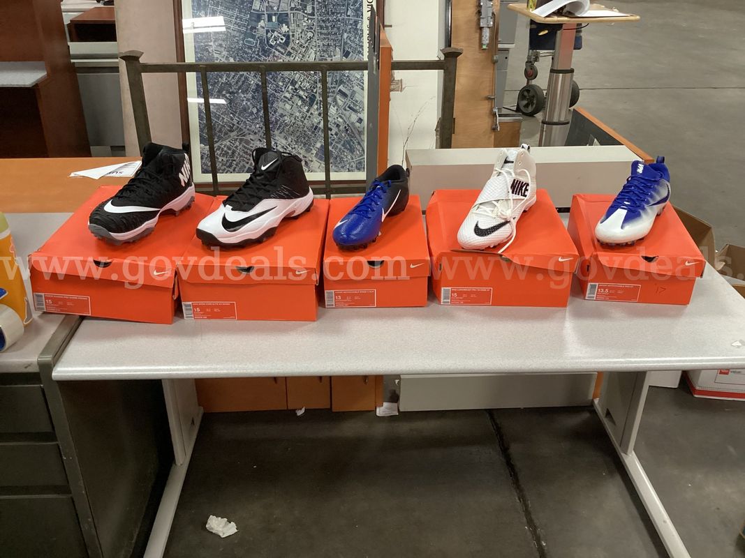 5 - Pairs of Nike Cleats (1 - size 13, 1 - size 13.5, and 3 - size 15)