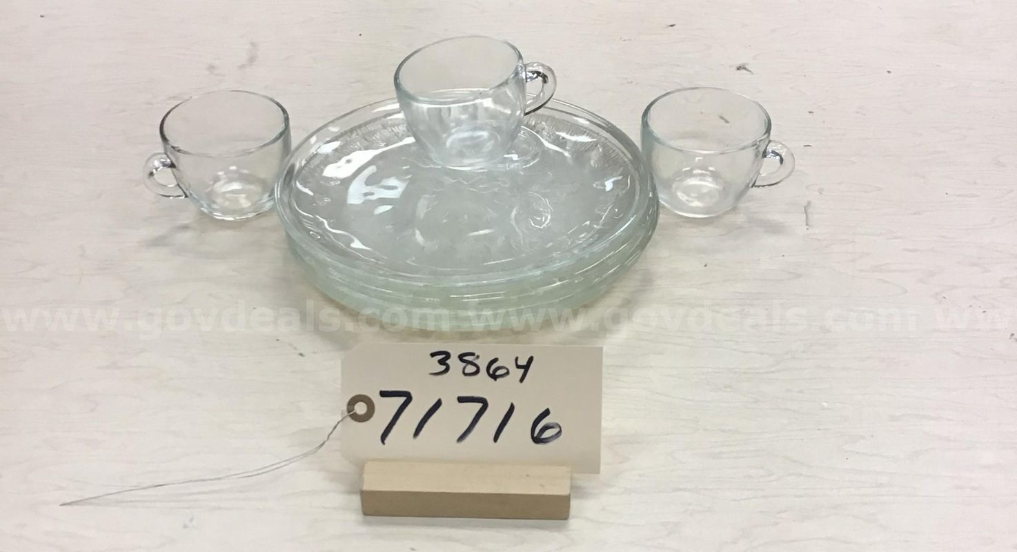 4 plates and 3 tea cups