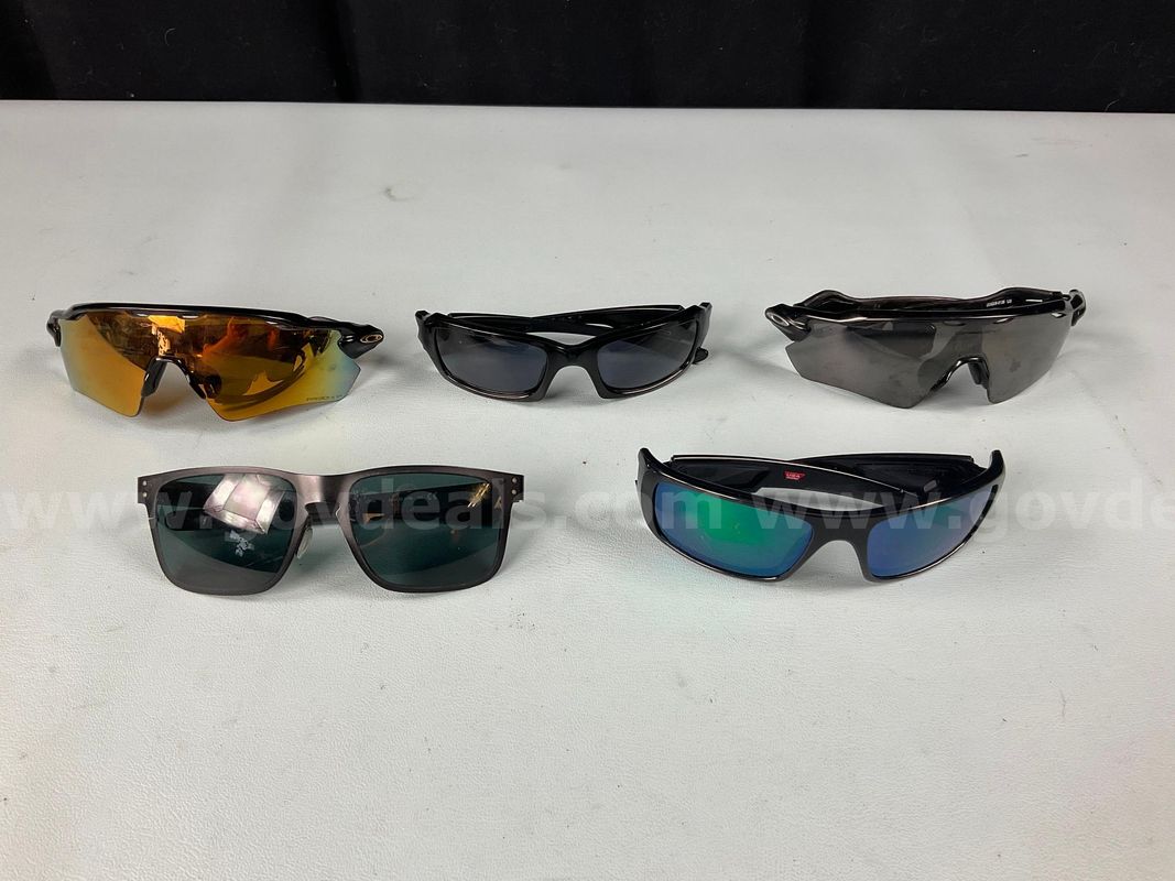 5 - Fashion Sunglasses Labeled Oakley (1 - Scratched Lens)