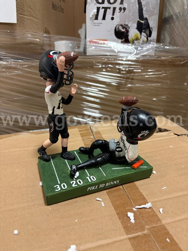 Lot of 12 Retired UC Football Bobbleheads