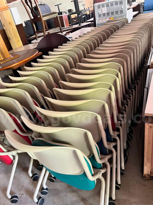 Lot of nesting chairs on casters